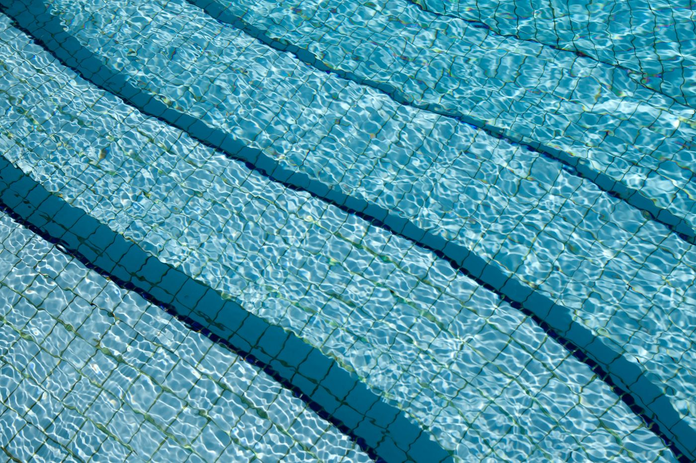 Clean residential pool steps and tile